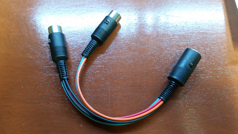 The +12V and Ground in the Front plug are bussed with the same in the Rear, which makes for only two wires to the one. This was good news for me on the 8-pin end; these are not exactly easy connectors to solder to.